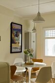 A Bauhaus-style dining table with chairs