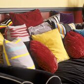 Various coloured sofa cushions