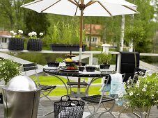 Breakfast under a sun umbrella on a terrace