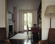 An open doorway and a view into a traditional living room