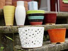 Flowerpots outside on stone steps