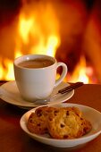 Hot chocolate and biscuits by the fireside