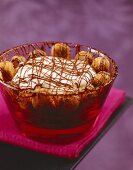 Tiramisu in a round glass bowl