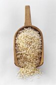 Arborio Rice in a Wooden Scoop