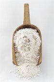 A Wooden Scoop Filled with Flour