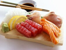 An Assortment of Sushi on Wooden Block