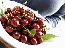 Holding Cherries in a Bowl