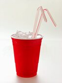 Red Plastic Cup with Ice and Straws