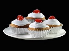 Cupcakes with cocktail cherries
