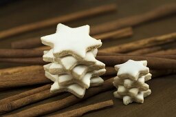 Stacked cinnamon stars on cinnamon sticks