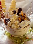 Assorted Christmas biscuits in festive bowl