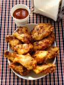 Barbecued chicken wings; barbecue sauce