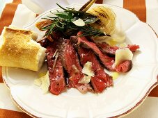 Beef steak with herbs, parmesan and white bread