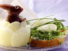 Cream cheese sandwich with cress; wax Easter Bunny