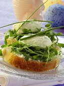 Cream cheese sandwich with cress; Easter eggs