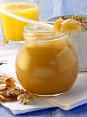 Blossom honey in jar & on spoon; cornflakes; orange juice