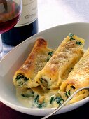 Cannelloni with spinach and pine nuts; red wine