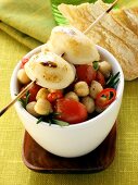 Barbecued calamares on chick pea and tomato salad