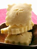 Filled sweet pastry biscuits in wooden bowl