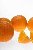 Oranges and wedge of orange