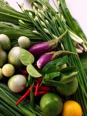 Asian vegetable still life with herbs and limes