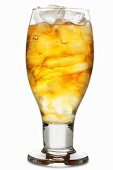 Iced tea with lots of ice cubes in glass