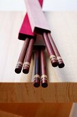 Japanese chopsticks on wooden board