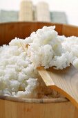 Boiled sushi rice in wooden bowl
