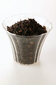 Tea leaves in glass bowl