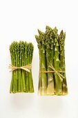 Different types of green asparagus in bundles