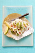 Ceviche: fish fillet with coriander and peppers