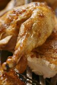 Crispy roast chicken legs on baking tray