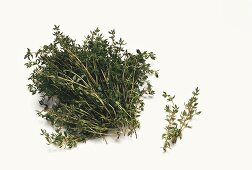 A bunch and a sprig of fresh thyme