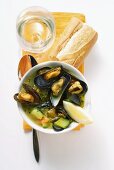 Mussel soup with courgettes; baguette
