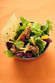 Mexican salad with mince, vegetables and cheese