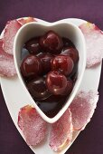 Cherry compote and sugared rose petals