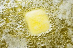 Heating butter and oil in frying pan