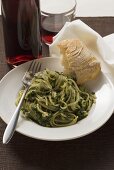 Linguine with pesto and Parmesan, white bread, red wine