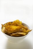 Potato crisps in bowl