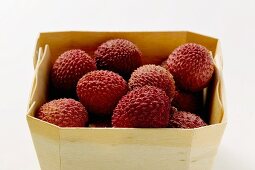 Lychees in woodchip basket