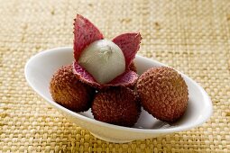 Lychees in white bowl