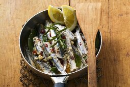 Fried anchovies with dried tomatoes (Calabria)