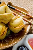 Deep-fried wontons with two sauces