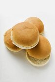 Four hamburger buns, split