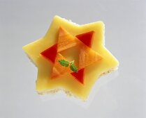 Star-shaped open cheese sandwich with pepper and carrot
