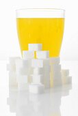 Orangeade & sugar cubes (picture symbolising high sugar content)