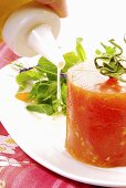 Tomato parfait with salad and dressing