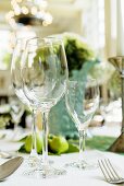 Table laid for special occasion with wine glasses