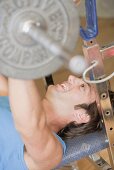 Man working out on weight bench