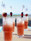 Berry cocktails with place cards on cocktail sticks